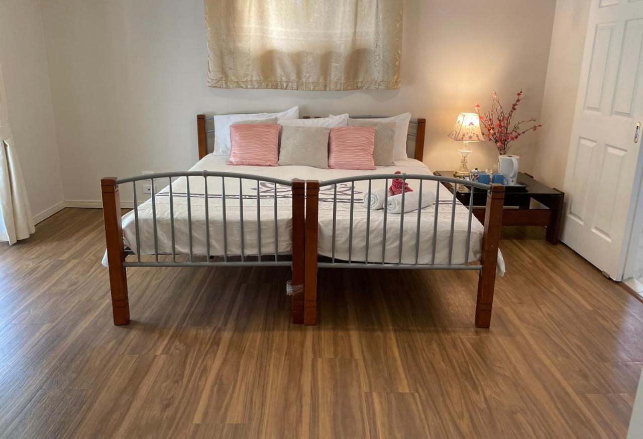 Theme Parks Amituofo Homestay โกลด์โคสต์ ภายนอก รูปภาพ